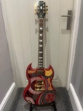 Epiphone Fatoumata Diawara SG, Ember Red with Malian Graphic. Electric guitar