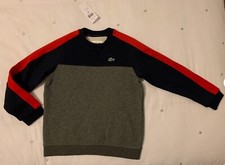 Image of BNWT boys LACOSTE jumper. Red, blue and grey logo sweatshirt top. Age 8.