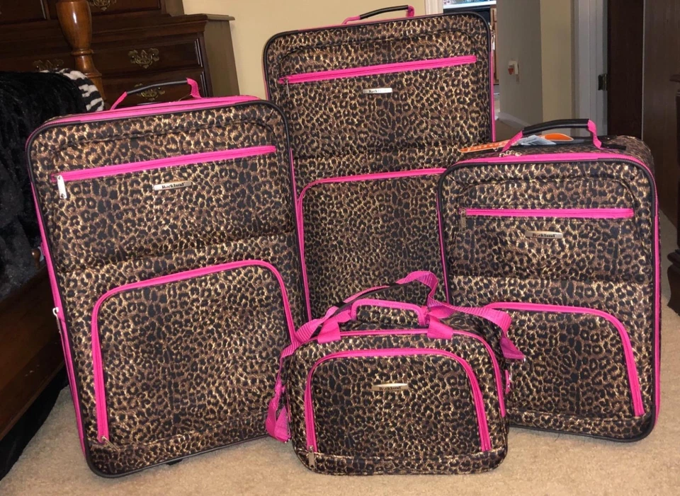 Rockland 4 Piece Luggage Set Softside Expandable 14" 29" 24" 28" Pink Leopard - Image 2 of 4