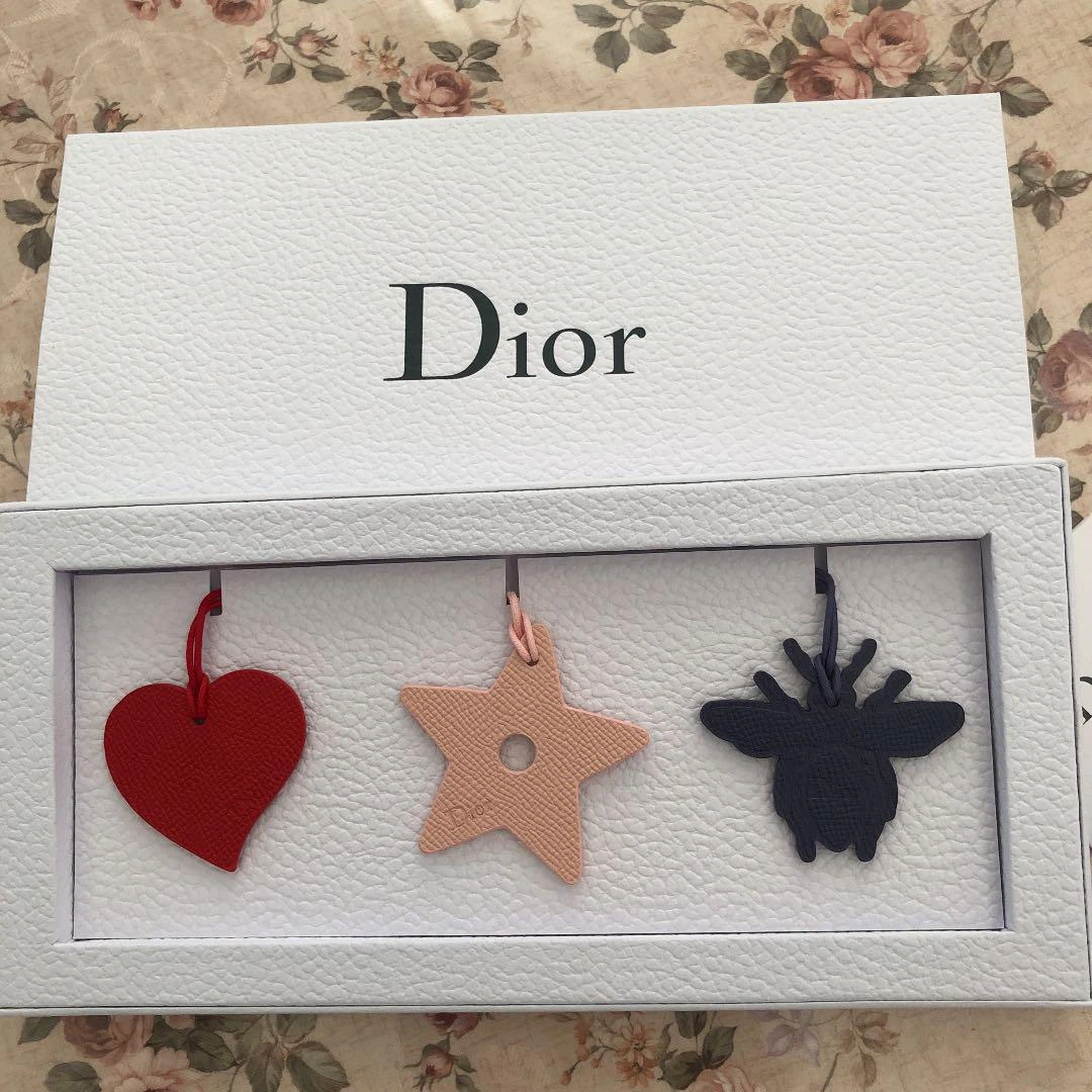 Sac Christian Dior inutilisé charme porte clés cœur étoile abeille article promotionnel