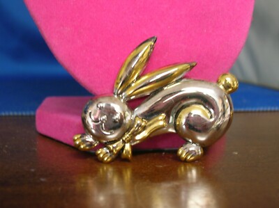 Smiling rabbit two tone pin/pendant with a bow around his neck  2 1/4'' long