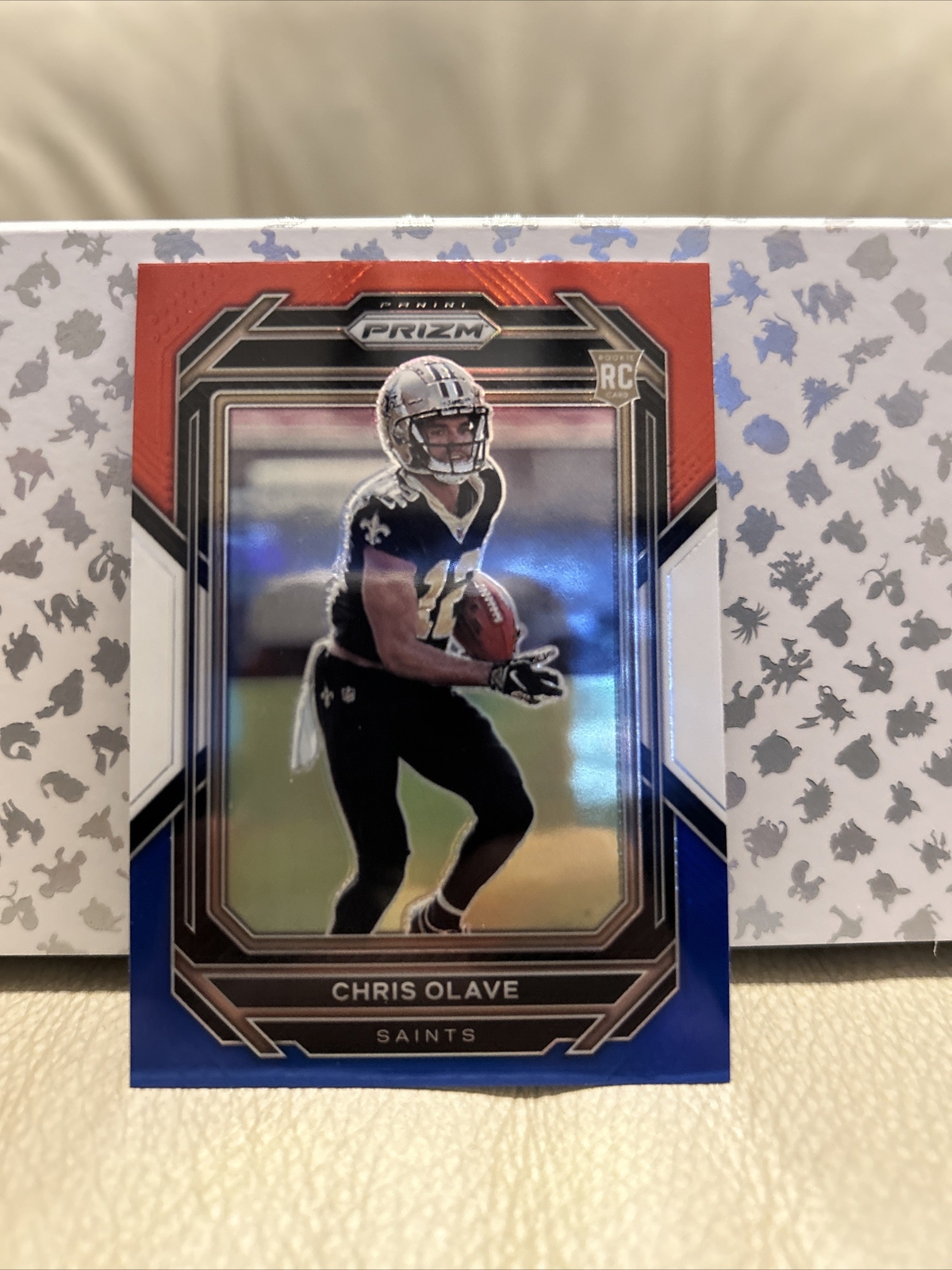 2022 Panini Prizm Chris Olave Red White Blue Prizm Rookie RC #310 Saints