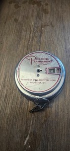 Vintage Permanent Steel Promotional Coin Bank
