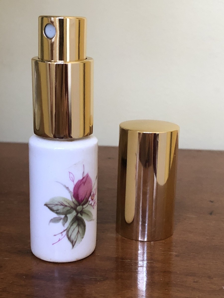 A travel size purse atomizer refillable fragrance to spritz,one Of A  Kind,new