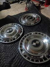 3 1961 Chevy Impala Aftermarket Hubcaps