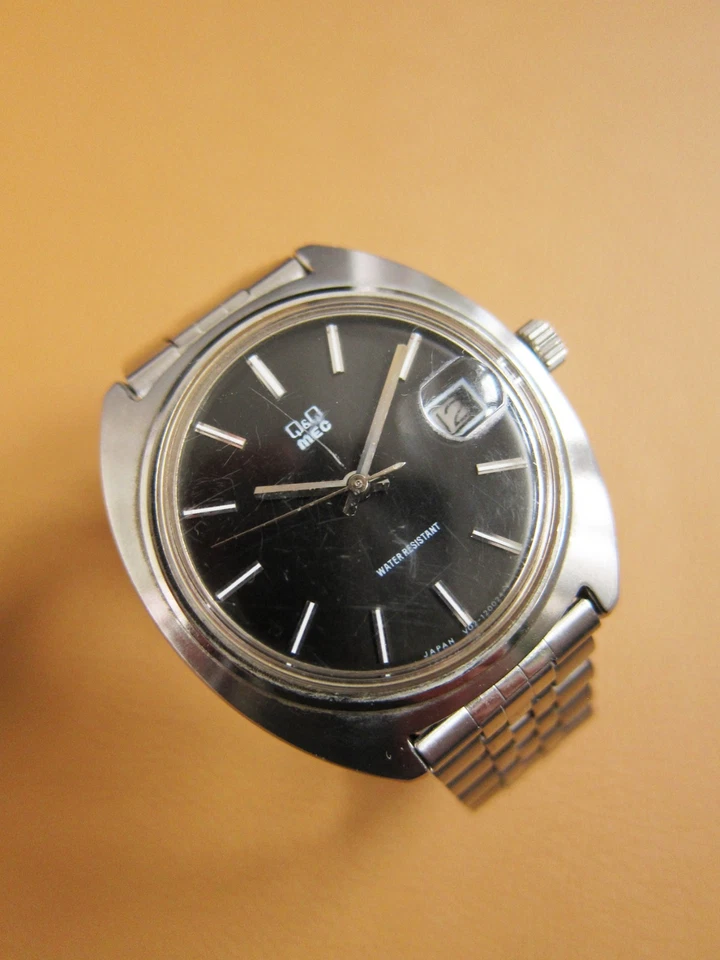 Reloj mecánico Q&Q (Citizen) MEC Y02-120027 con esfera negra (HECHO EN JAPÓN) Foto 2 de 4