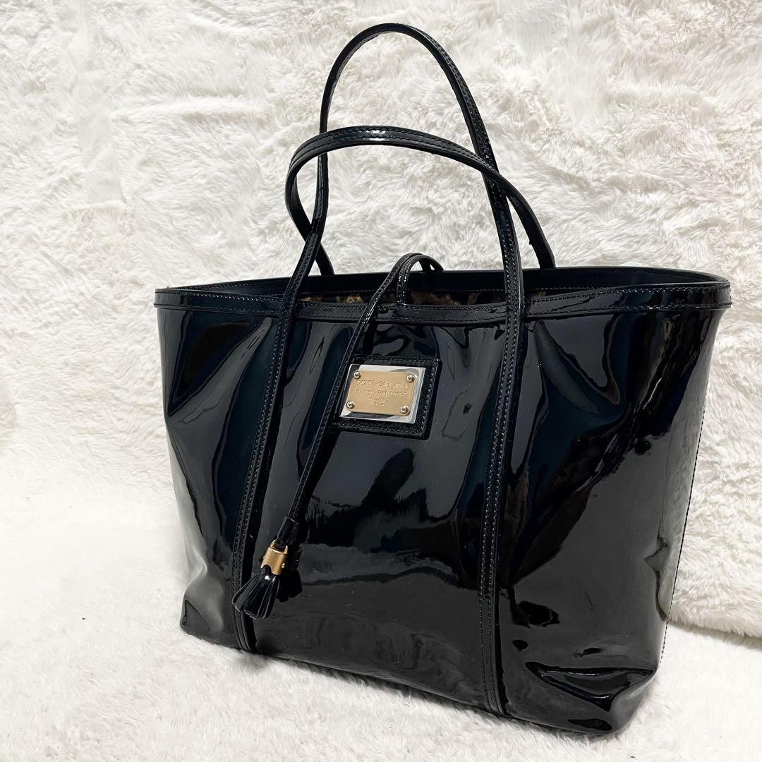 Dolce Gabbana Leopard Print Enamel Tote Bag with Tassel Details and Spacious Design