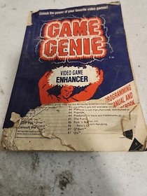 GAME GENIE  Video Game Enhancer  WITH BOOK  NES Nintendo Video Game