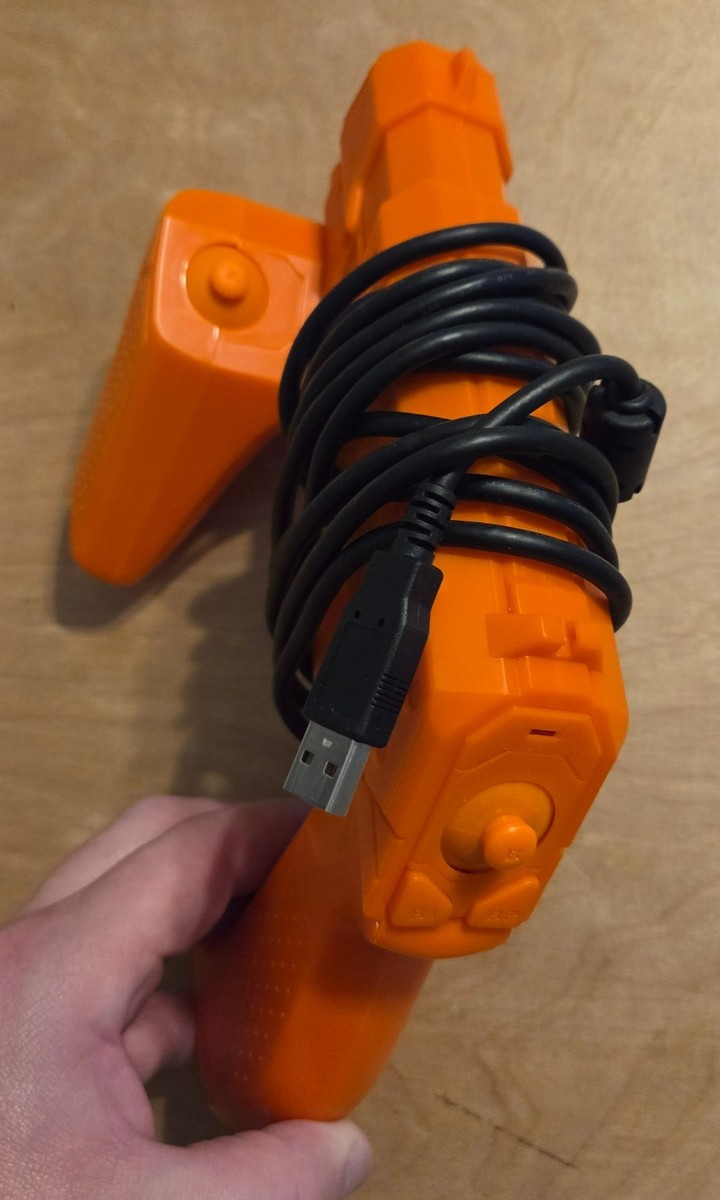 Pistolet Optique Namco Guncon 3 Pour PS3 - Modèle NC-109 - Orange, Fonctionnel - Occasion