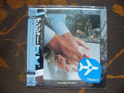 CD UK -Danger Money / SHM-CD CARDBOARD SLEEVE,HR CUTTING (2014) JAPAN OBI NEUF 3 - Photo 1/2