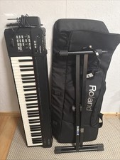 Roland RD64 Stage Piano Keyboard with Bag Sustain Pedal and Quiklok Stand