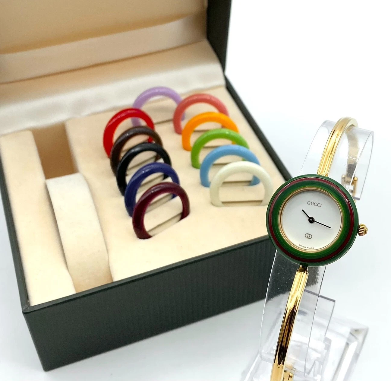 Montre femme Gucci lunette à changement 12 couleurs cadran doré emballée en stock fonctionne