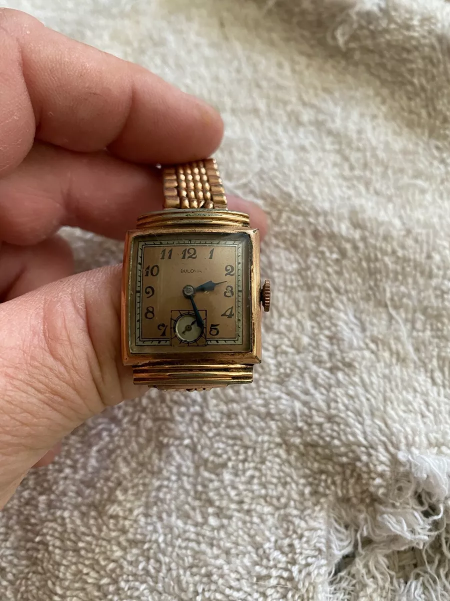14k rolled top gold bulova plate