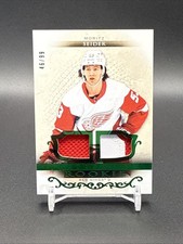 2021-22 ARTIFACTS ROOKIE EMERALD JERSEY DUAL PATCH MORITZ SEIDER 46/99 RED WINGS