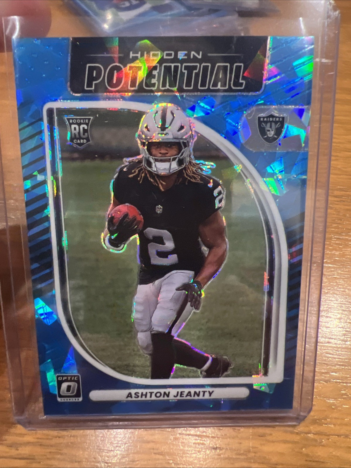 2025 Optic Football Ashton Jeanty Hidden Potential Blue Cracked Ice /55