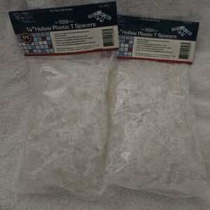 1/4 Hollow Plastic T Spacers 2 pack 500 pcs each pack.
