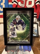 Fanatics Under Wraps Emanate NHL Connor Hellebuyck /99