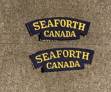 Pair Of British Made Seaforth Highlanders Shoulder Titles Unworn. Melton Wool