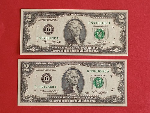 Two $2 Federal Reserve Notes two dollar 1976 green seal uncirculated one MISCUT