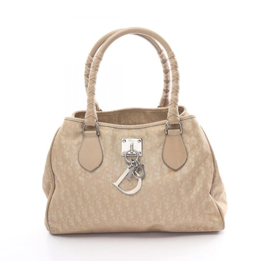 Sac à main Christian Dior trotteur toile enduite cuir beige couleur argent femme