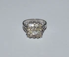UNCAS STERLING SILVER AND CLEAR CZ RING SIZE 5