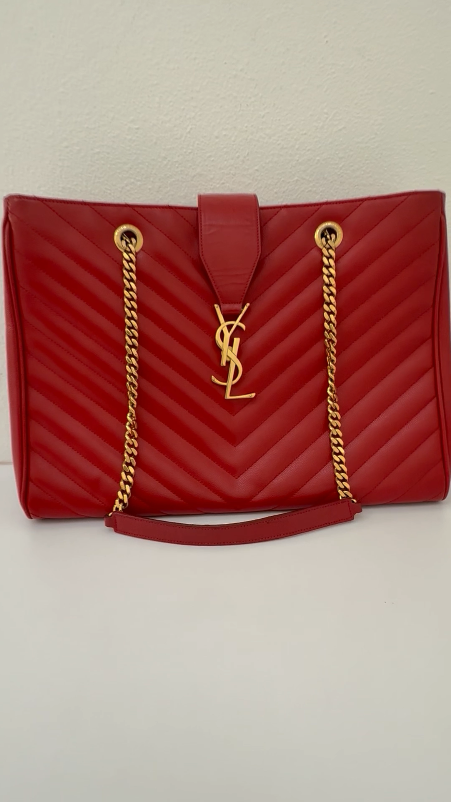 Borsa Cassandra YVES SAINT LAURENT rossa trapuntata pelle grana monogramma catena