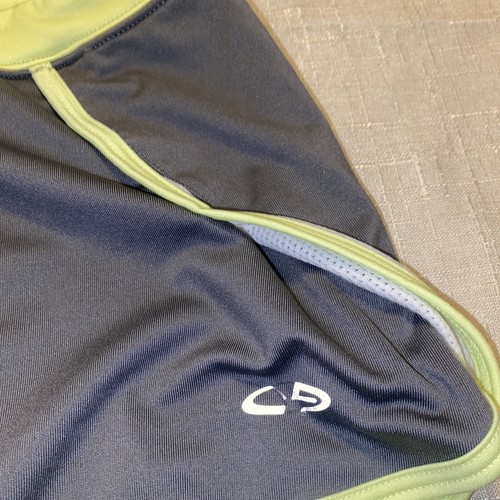 Falda corta Champion gris con detalles en verde neón para niñas talla 6-6x - Imagen 3 de 6