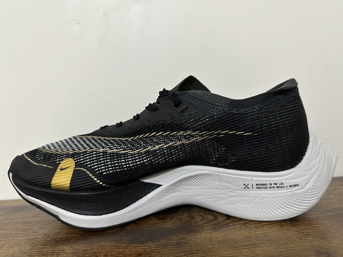 NIKE WMNS ZOOMX VAPORFLY NEXT% 2 BLACK METALLIC GOLD COIN