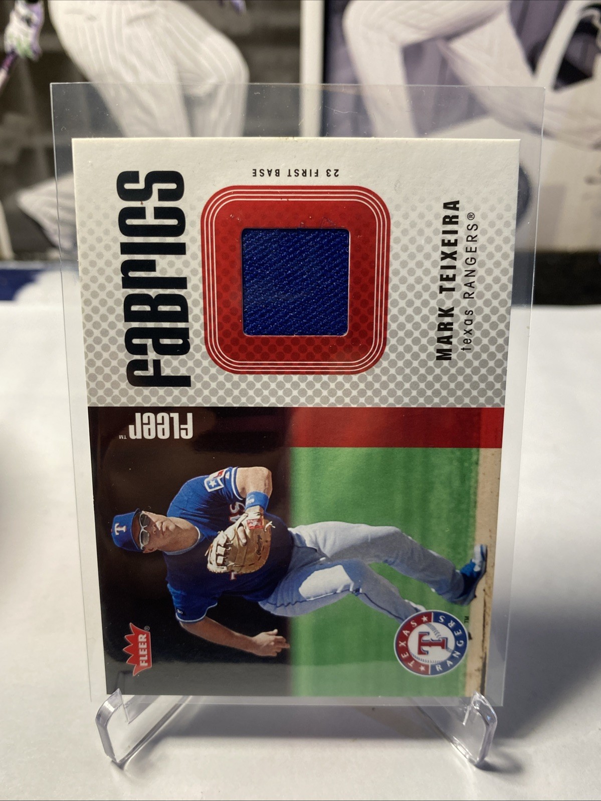 2006 Fleer Fabrics Mark Teixeira #FF-MT Game Used Jersey Relic Texas Rangers