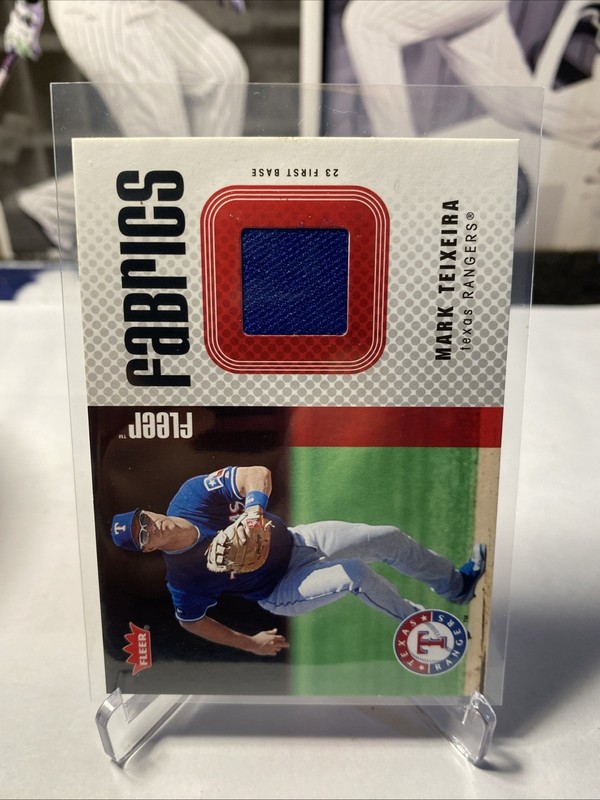 2006 Fleer Fabrics Mark Teixeira #FF-MT Game Used Jersey Relic Texas Rangers