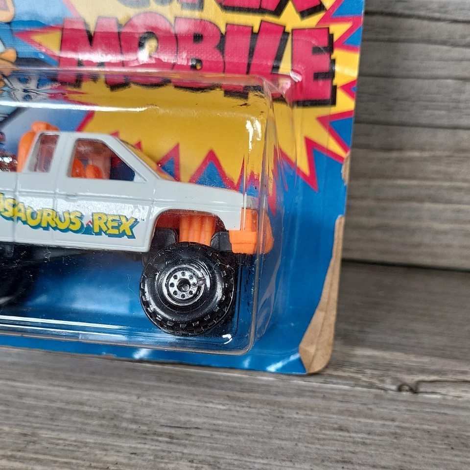 Camión Nissan móvil Hot Wheels KRAFT C.Rex tarjeta sin perforar pero dañada Foto 3 de 4