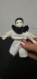 small porcelain clown dolls