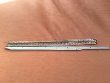 BMC nos mk1 mini....Chrome door window finisher ( Right) dated 2/67.