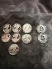 9oz of pure .999 silver 7 eagles and 2 bitcoin rounds.