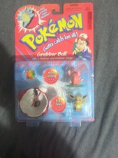 RARE 1999 POKEMON GRABBER BALL #108 LICKITUNG...