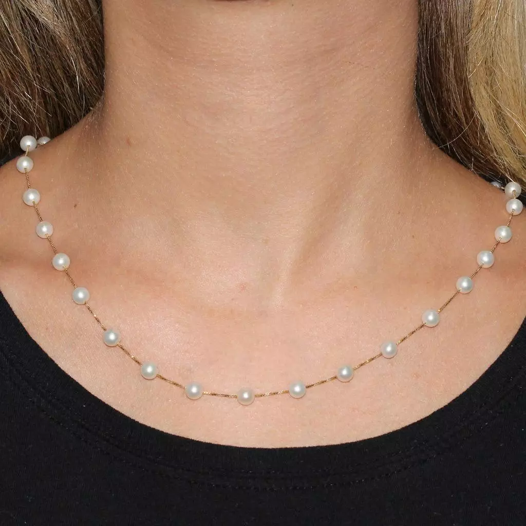 Spaced pearl best sale necklace