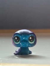 Four LPS :  Orbit Manatte  , Mini Baby Blue Whale, Penny Guinn and Checkers