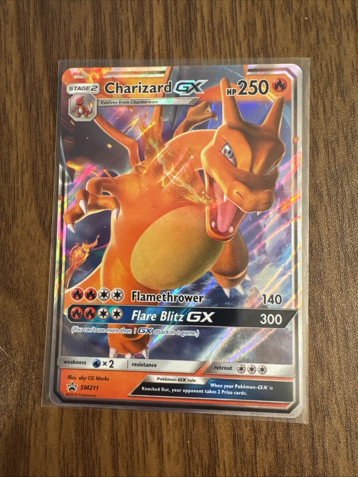 Pokemon Charizard GX - SM211 SM Promo card NM