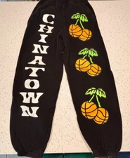 Chinatown Market Sweatpants Medium Black Cherries Basketball Graphic - Flaws