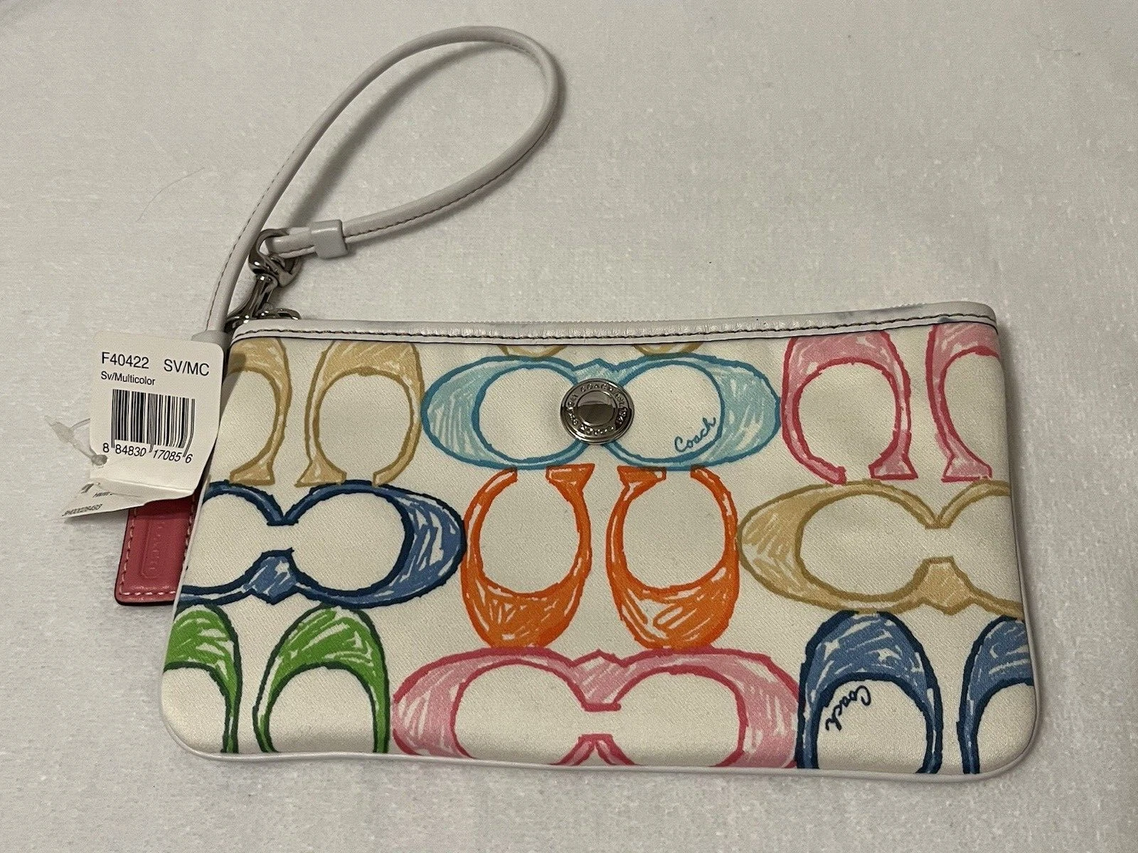 Braccialetto Coach Hampton Scribble nuovo bianco e multicolore pastello logo 'C' 8"