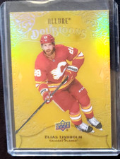 2022-23 U.D. ALLURE DOUBLOONS DB-32.  ELIAS LINDHOLM.  GOLD.  Calgary Flames