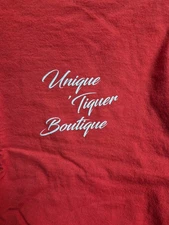 Unique 'Tiquer Boutique T-Shirt and loyalty program