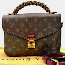LOUIS VUITTON Monogram Braided Pochette Metis Safran Bag