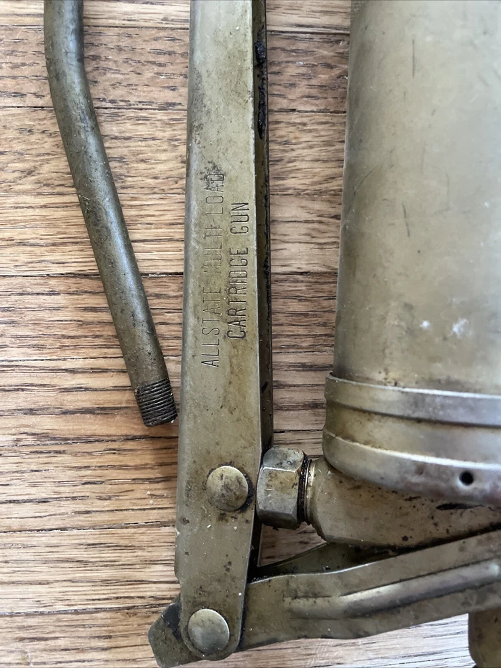 Pistola de cartucho de carga múltiple Allstate con manguera usada. Foto 2 de 4
