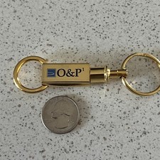 Orthotics  Prosthetics One O P1 Pull A Part Gold Keychain Key Ring 47814