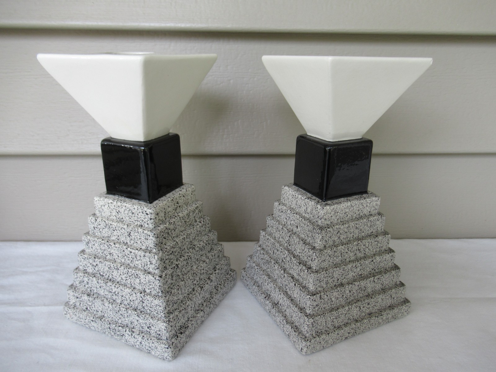 Pair of pyramid-style postmodern candlesticks by Michael Duvall