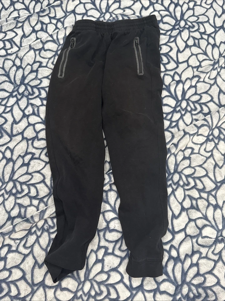 Pantalones deportivos para hombre talla 6 pequeños Old Navy con cordón y bolsillos con cremallera Foto 3 de 4
