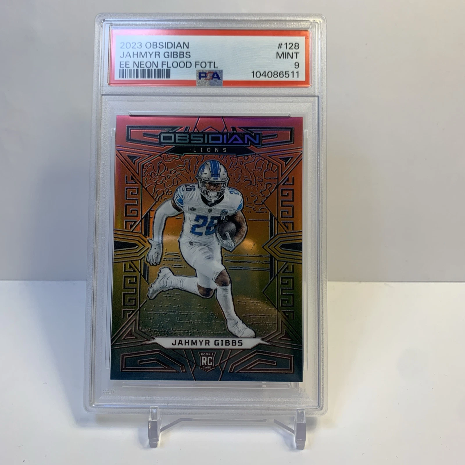 Jahmyr Gibbs Panini Obsidian #128 FOTL Neon Flood Electric Etch