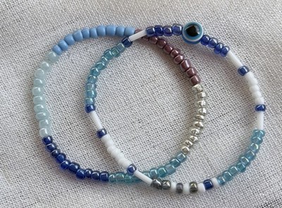 Beaded bracelets two-pack.Blue,white,silver beads,evil eye bead.Guards/protects.