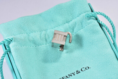 Tiffany & Co Silver Atlas Roman Numeral Lock Charm Pendant For